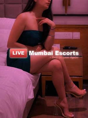 beautiful model sitting in skirt in a hotel room